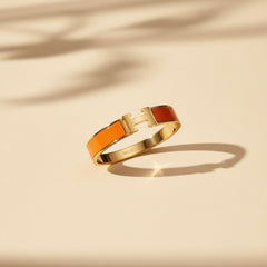 Orange H Clack Bracelet- Gold Toned Enamel Cuff
