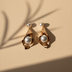 Gold Sculptural Pearl Drop Earrings – Modern Abstract Pearl Statement Earrings