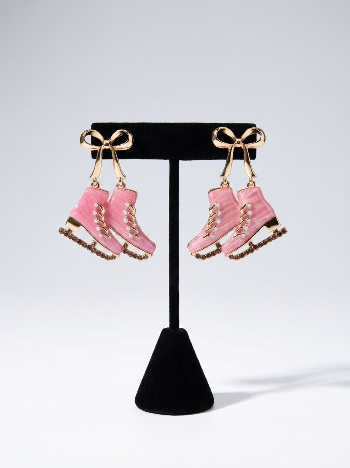 Blush Ice Skate Bow Statement Earrings